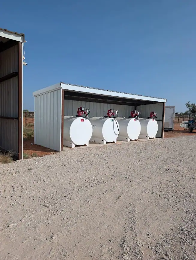 White steel shed housing propane tanks